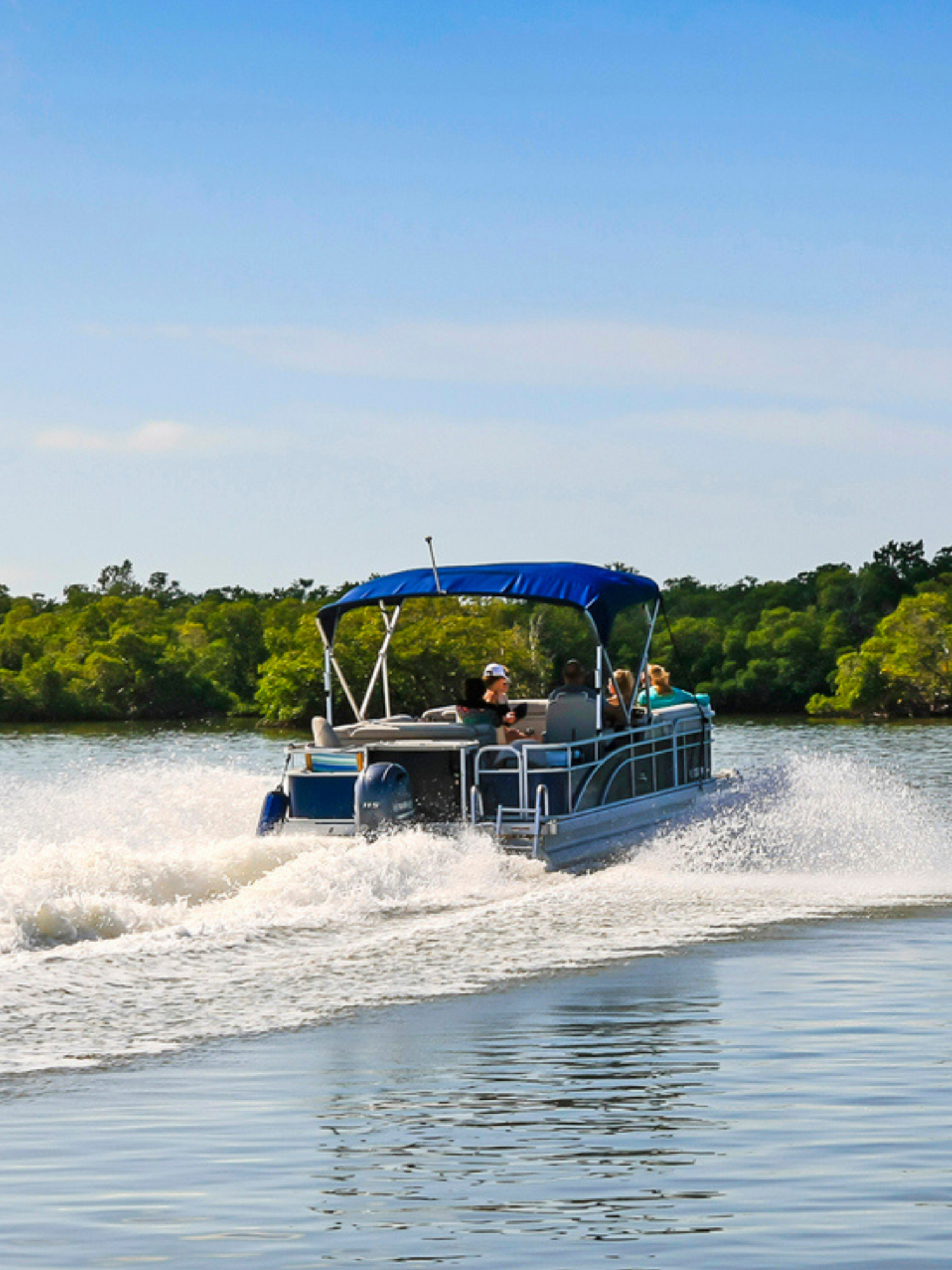 pontoon boat sailing in a lake